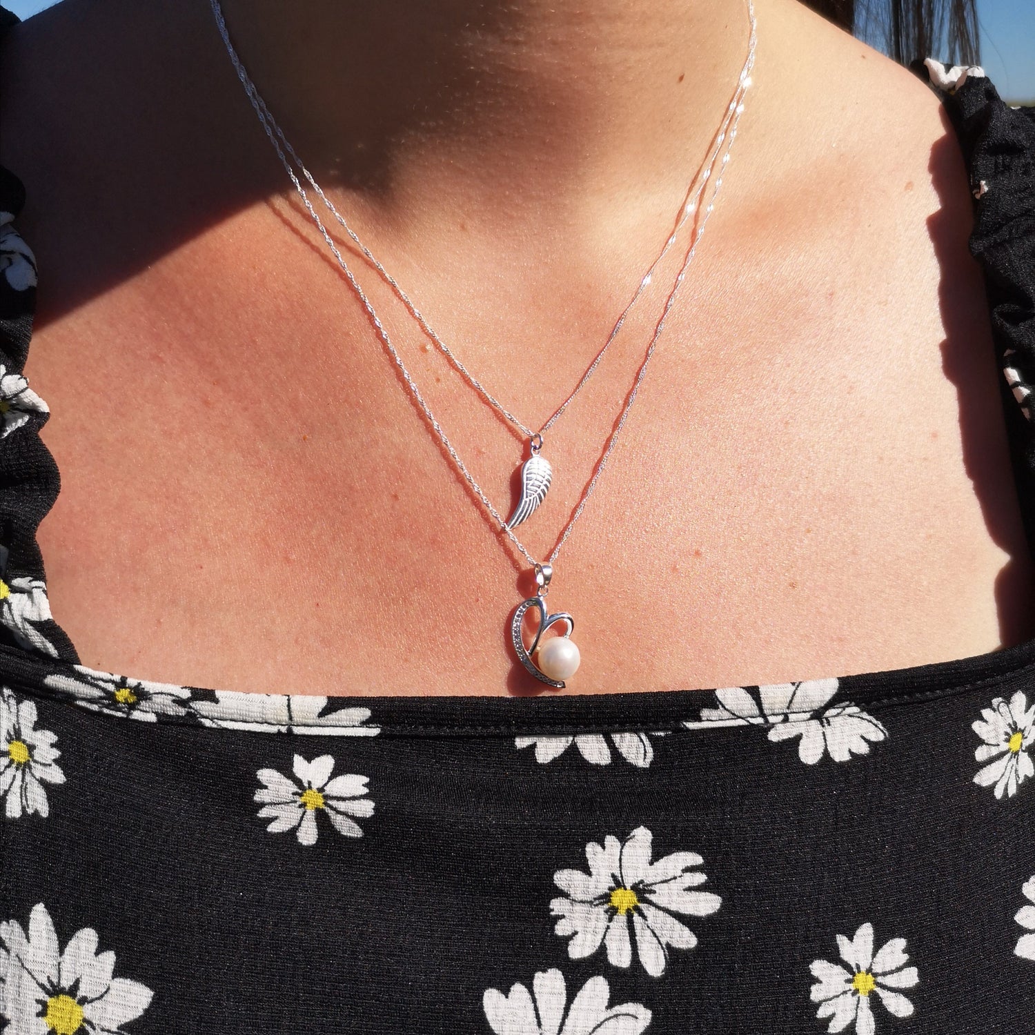 woman wearing sterling silver necklace stack