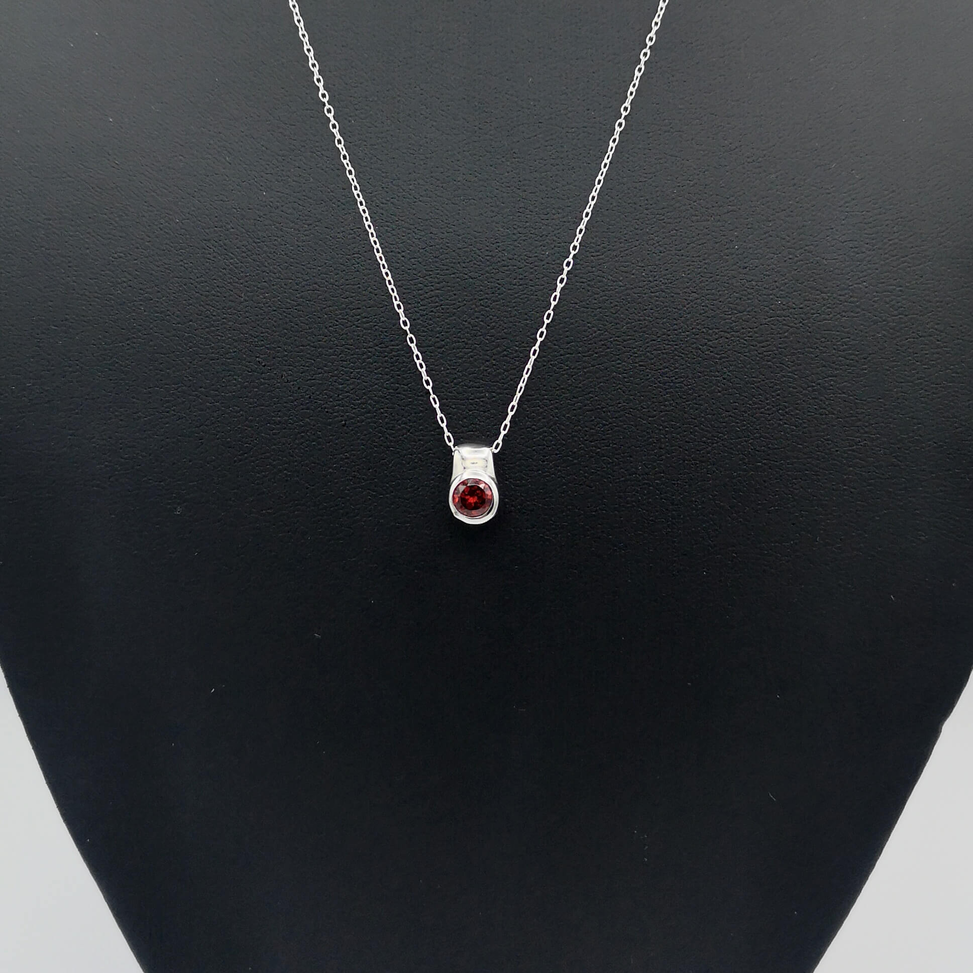 Sterling Silver Round Bezel Set Garnet Pendant