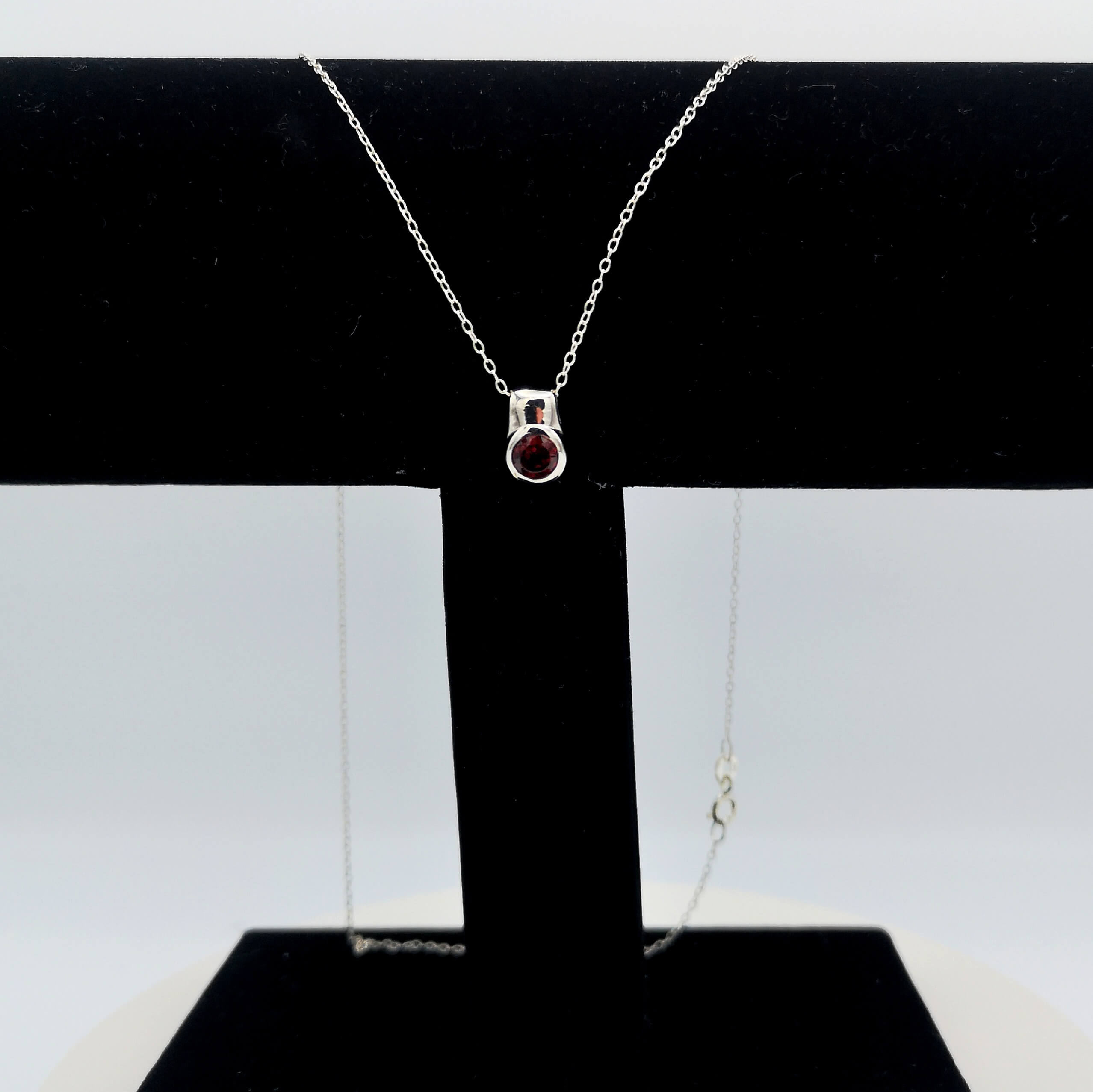 Sterling Silver Round Bezel Set Garnet Pendant